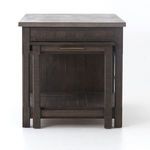 Extended pull-out wooden table fully slid out from the side of the kitchen island