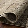 Curled corner revealing backside weave and thickness of the sage and ivory power-loomed rug