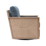 Side view showing woven natural fiber panel on the chair’s wooden frame