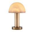 Slightly angled view of La Gravite Mini Table Lamp glowing against white background