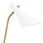Close-up side view of white metal shade and brass-toned joint detail on Spyder Task Lamp