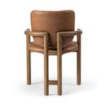 Rear view showing distinctive three-leg wooden frame and curved backrest of Madeira Dover Crescent Dining Chair