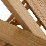 Close-up showing metal hinge mechanism on teak frame for adjustable backrest support.