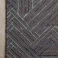 Verve Graphite / Ocean Rug with bold linear geometric pattern in dark graphite and ocean blue hues