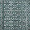 Teal and dove traditional rug with geometric architectural patterns and a decorative border