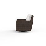 Side profile of Montecito club chair highlighting cushion thickness and wicker texture