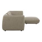 Side profile emphasizing the smooth, curved armrest and seat cushion floating on small black feet