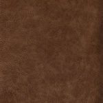 Close-up of curved ash armrest attached to intensely tufted leather back.