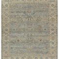 Full rug flat lay showing overall hand-knotted medallion and floral design colors