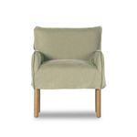 Front view of slipcover armchair showcasing wide cushioned seat and square backrest