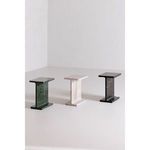 Three Tullia Accent Tables in green, taupe, and black marble displayed side by side in room corner