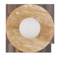 Wall sconce viewed straight on with visible frosted globe and travertine disc in warm tones