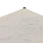 Oblique view showing bronze-finished frame and white marble shelves with subtle veining