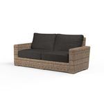 Havana Loveseat outdoor sofa with aged tobacco all-weather wicker frame and dark cushions