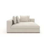 Right-facing corner chaise sofa in light beige corduroy fabric with four matching down pillows and a generous armrest