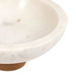 Partial angled close-up of bowl rim and inner curved surface
