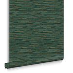 Rolled grasscloth wallpaper showing texture and color pattern with teal and subtle yellow woven stripes