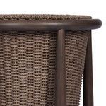 Close-up side view showing weave texture and teak frame joint of Kernan Basket