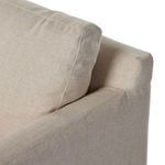 Angle close-up showing back cushion seam and curve at the chair's rear side