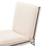 Close-up detail of taupe fabric texture and iron frame on Ventura Irving Dining Chair