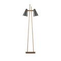 Duet Floor Lamp styled in room with parquet wood flooring, beige curtain, and green paneled walls