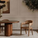 Martens chair in dining room with a second chair partially visible opposite, set on neutral rug