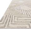 Close-up angled side view of wool rug highlighting raised geometric pattern and texture