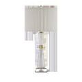 Edelmar White Table Lamp from front with slightly dimmed light and pleated shade