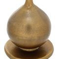 Detailed close-up showing textured spherical base and flat foot from a slightly different angle
