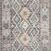Long runner style of the rug with the same geometric pattern and color scheme