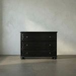 Lauren Dresser in hand-rubbed black with mahogany finish, three drawers with brass pulls, rounded feet