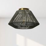Ceiling light mounted on white ceiling with natural daylight casting shadows through woven shade