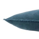 Side angle highlighting fringe detail and soft velvet texture in solid dusty blue color