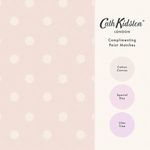 Wallpaper with button spot pattern alongside three paint color matches in neutral and pastel tones