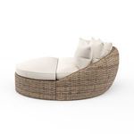 Profile side angle highlighting sloped backrest and cushioned seating