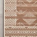 Close-up of Ari Natural Ivory Rug corner highlighting woven texture and clean edge binding.
