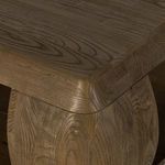 Close-up of beveled edge and vertical rounded support showcasing wood grain variations