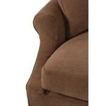Detail of upper arm and back cushion intersection showing linen fabric and tight tailoring
