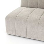 Close-up view of backrest channels with consistent vertical seams on sand colored fabric