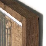 Close-up of walnut frame corner with visible wood grain and smooth finish