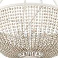 Front view lit chandelier with visible wiring loops from wrought iron connecting to hanging straps
