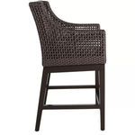 Side profile view of Peninsula Mahogany Counter Stool highlighting rattan arm and back weave