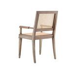 Side and back angle showing octagonal cane pattern with curved backrest and wood grain texture