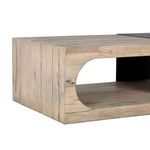 Close view of hollow side section in Danica Coffee Table emphasizing layered oak wood texture and natural cracks