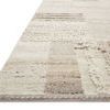 Side view showing the rug's thickness and texture contrast with high loops and flat patches