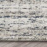 Close-up showing thick, hand-carded wool texture with visible loops and woven detailing