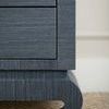 Close-up of the dresser’s textured base and soft curved corner detail on navy blue finish.
