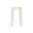 Side profile of white raffia console table highlighting leg depth and rectangular form