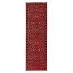 Long rectangular indoor-outdoor rug with a vivid red and black Turkish-inspired medallion pattern