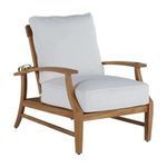 Angled front view of Croquet teak recliner with white cushions and armrests